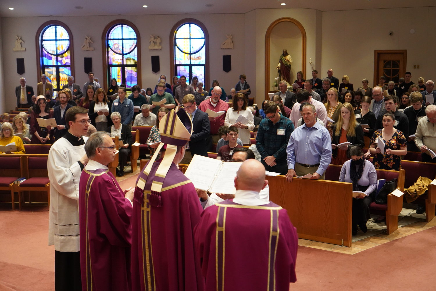Bishop W. Shawn McKnight speaks to candidates for Easter Sacraments during the Rite of Election and Call to Continuing Conversation, held on the First Sunday of Advent in Our Lady of Lourdes Church in Columbia. The event could not be held in the Cathedral of St. Joseph, which is undergoing an extensive renovation.